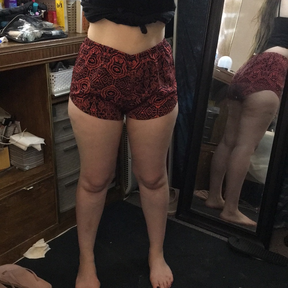 Dolphin hem shorts. Never worn. Ambiance apparel M